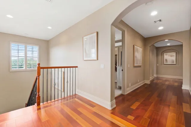 a view of swimming pool with outdoor seating and a potted plant