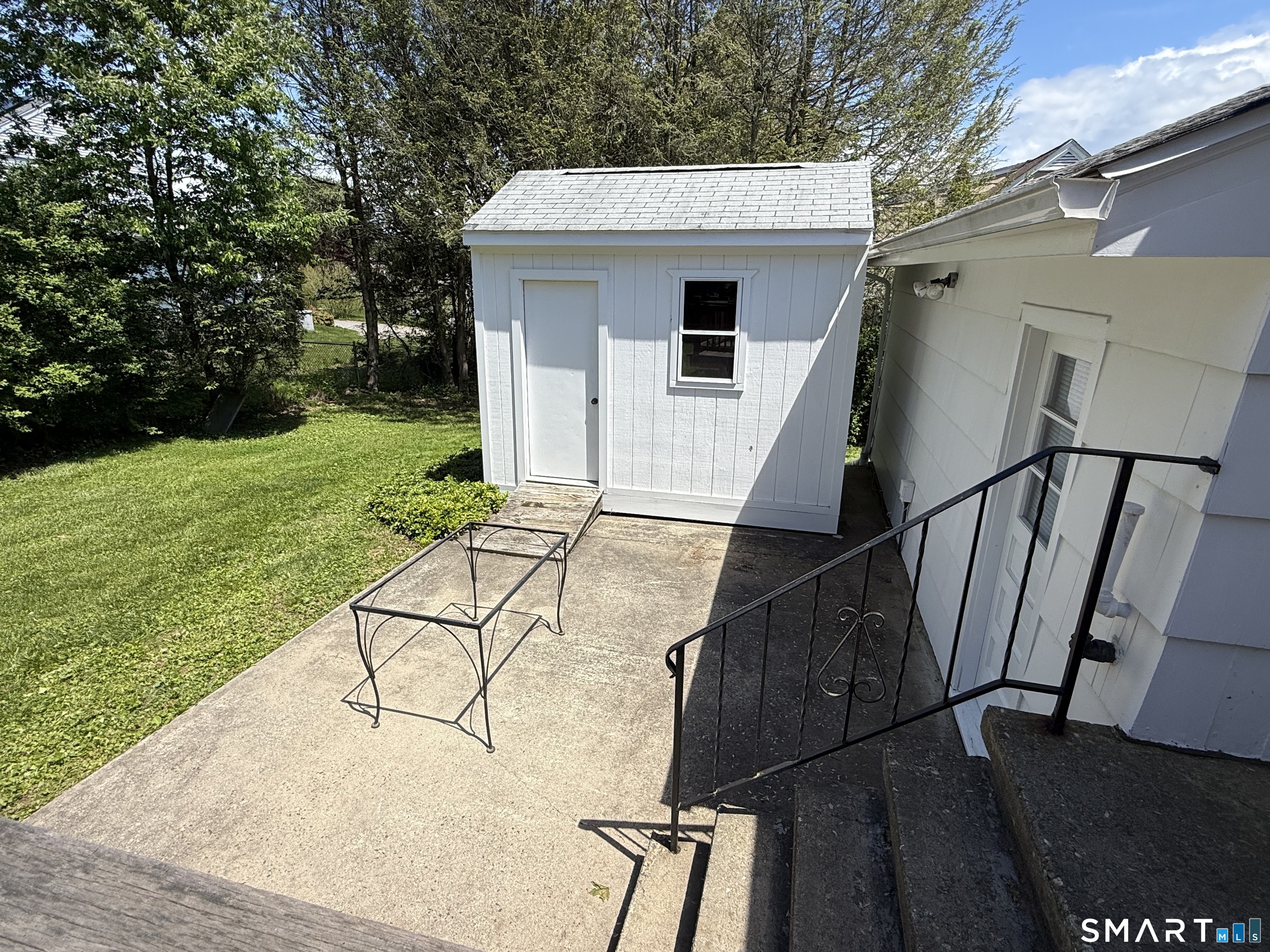 26 Maple Street Trumbull, CT 06611 - Photo 7 of 37 a view of a house with backyard and porch