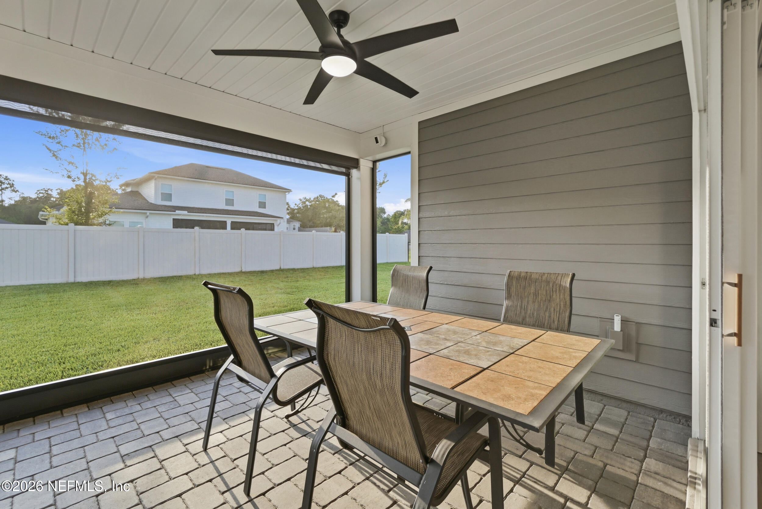 34 Red Rock Lane St. Johns, FL 32259 - Photo 48 of 71 a view of a patio with a table and chairs