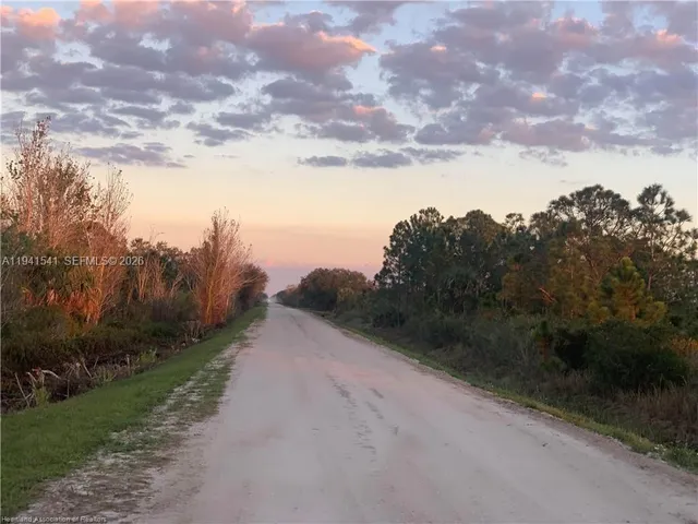 a view of an ocean and a mountain