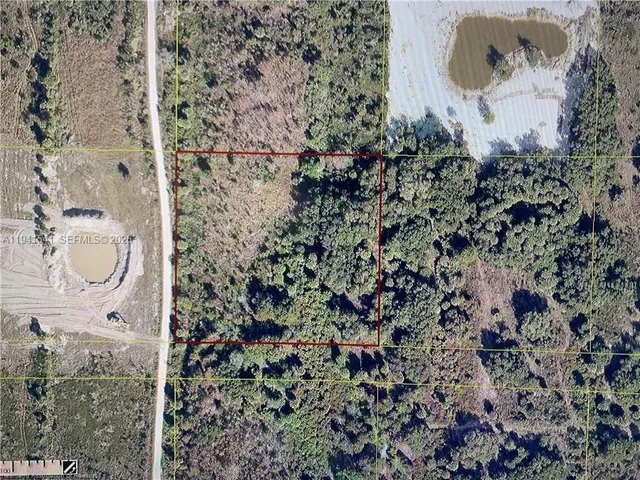 view of a bathroom with a sink and mirror