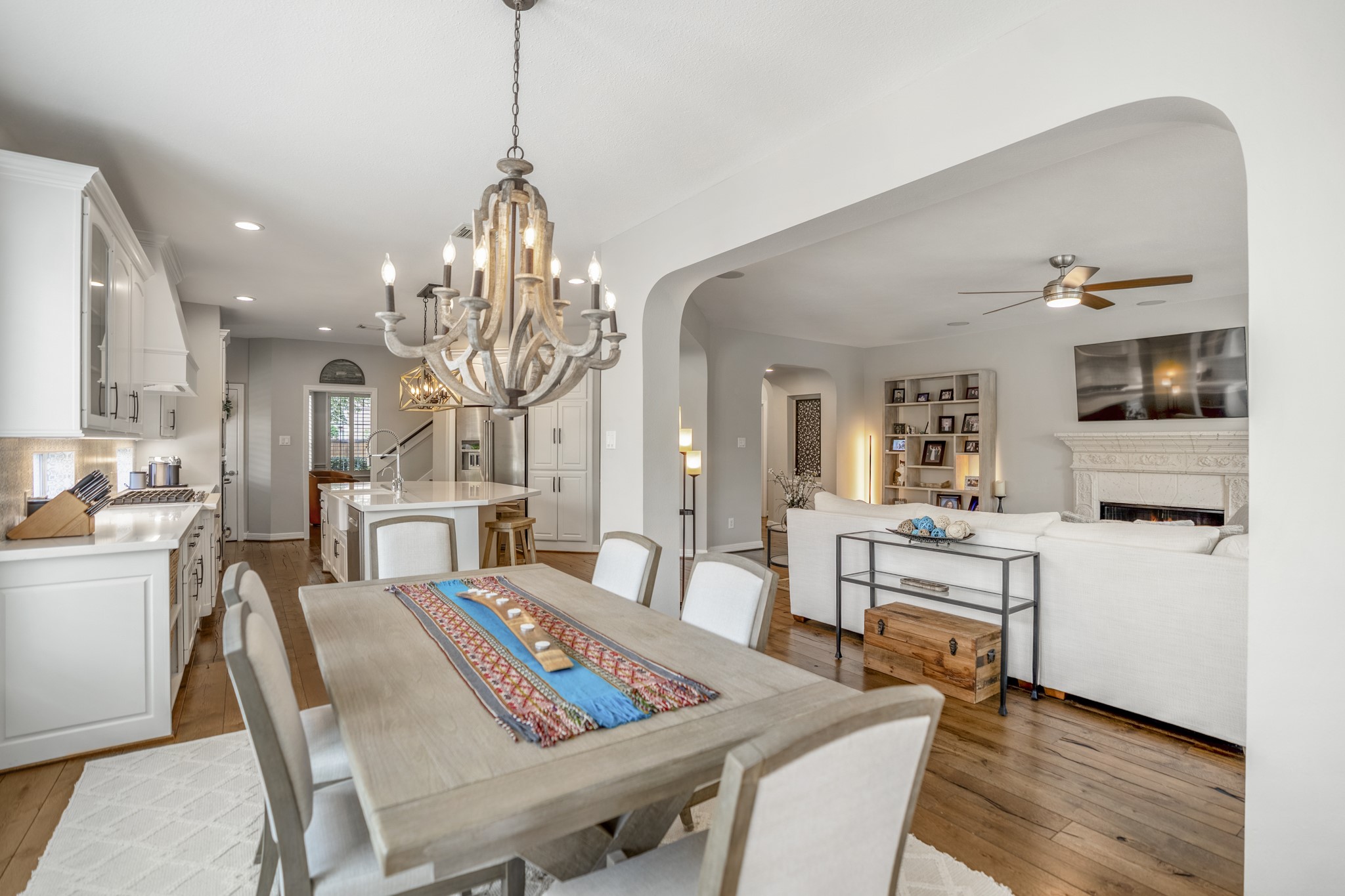 9707 Blue Cruls Way Spring, TX 77379 - Photo 22 of 50 a view of a dining room with furniture and wooden floor