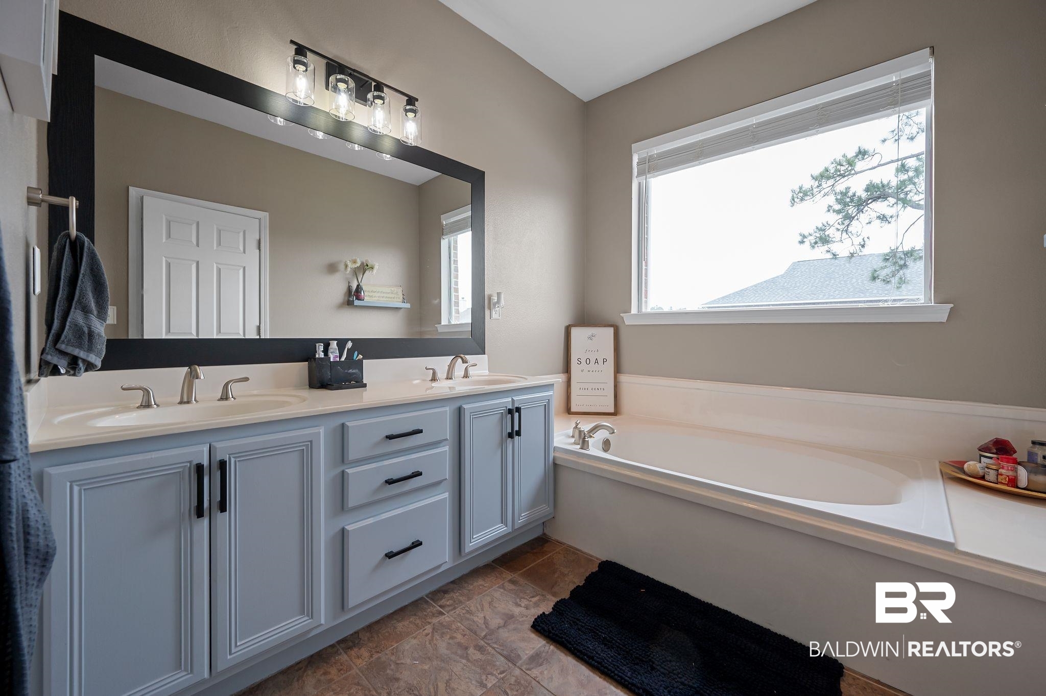 1287 Pembroke Way Foley, AL 36535 - Photo 23 of 39 Full bathroom featuring double vanity and a bath
