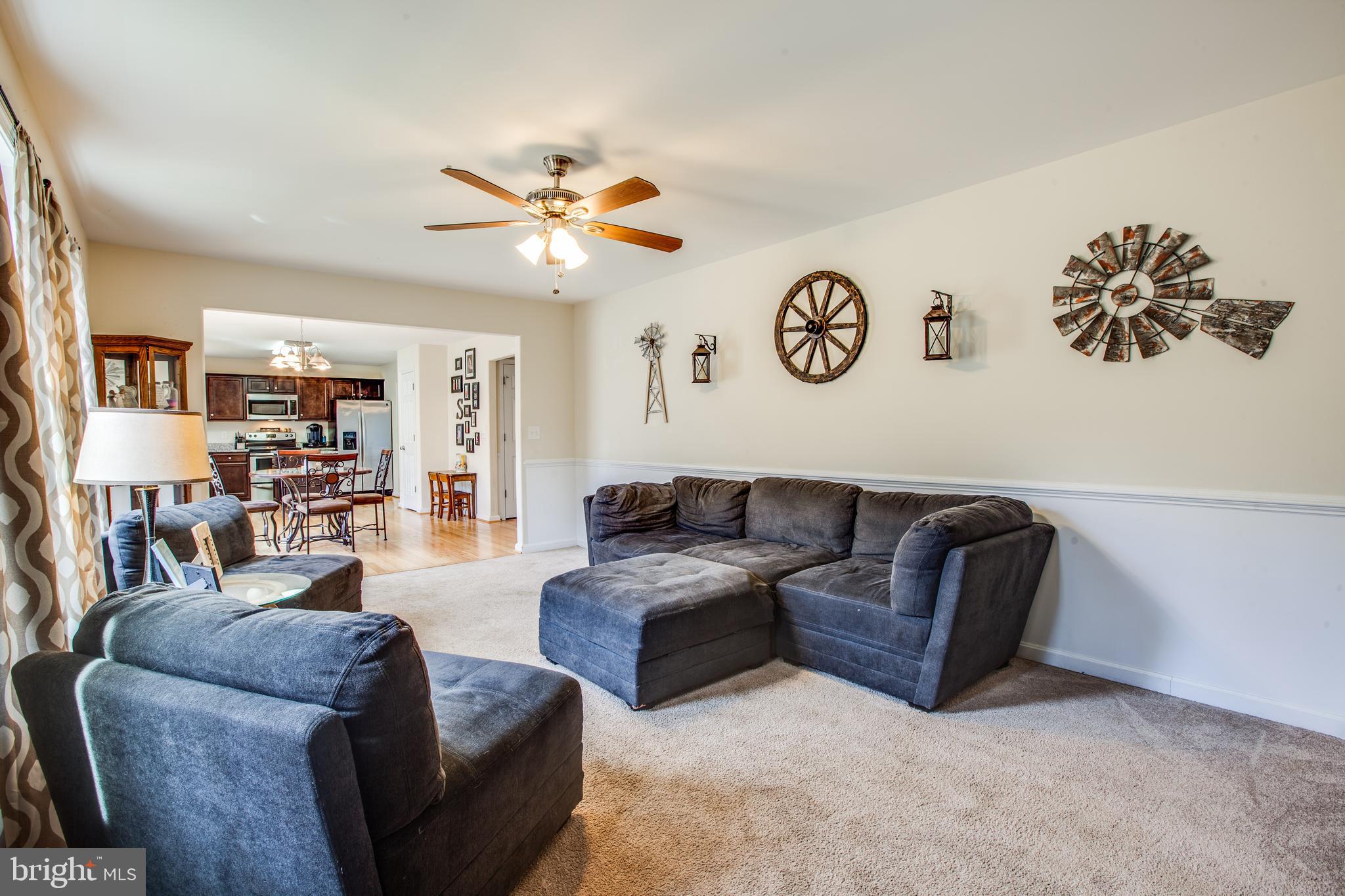 9060 Basil Road King George, VA 22485 - Photo 32 of 53 Chair Railing in Family Room
