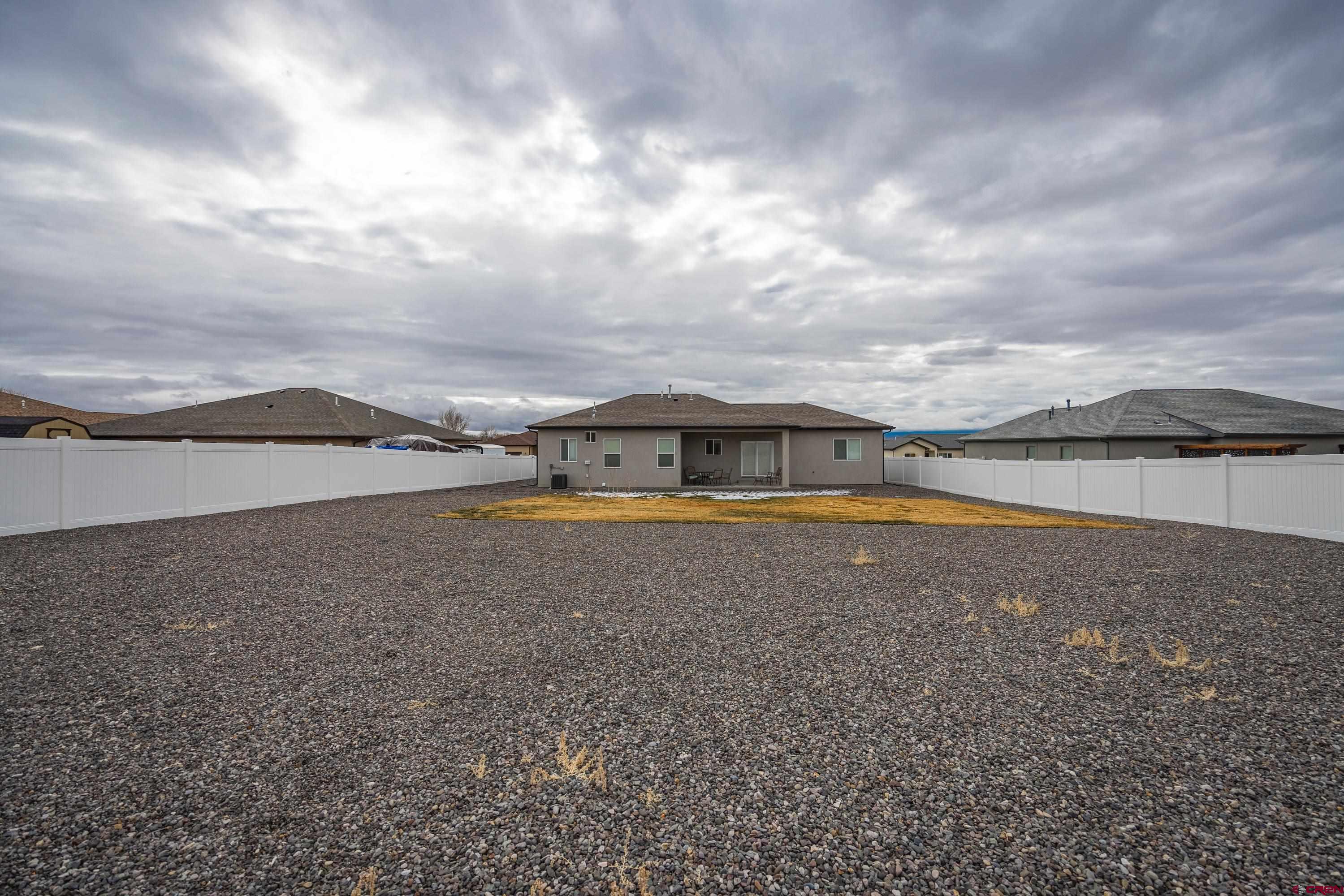 1725 Moonlight Drive Montrose, CO 81401 - Photo 34 of 35 a view of a swimming pool and an outdoor seating