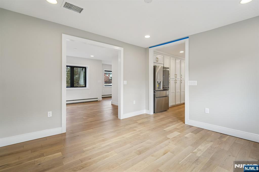 292 Magnolia Avenue Cresskill, NJ 07626 - Photo 21 of 50 a view of a livingroom with wooden floor
