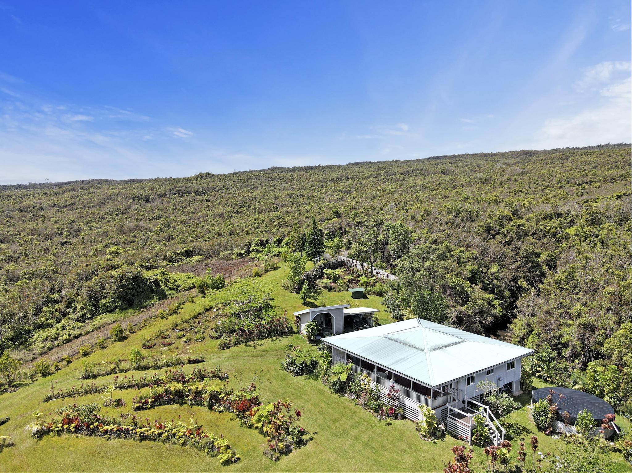 34-1480 Honomainoa Road Papaaloa, HI 96764 - Photo 17 of 30 a view of a terrace with a mountain