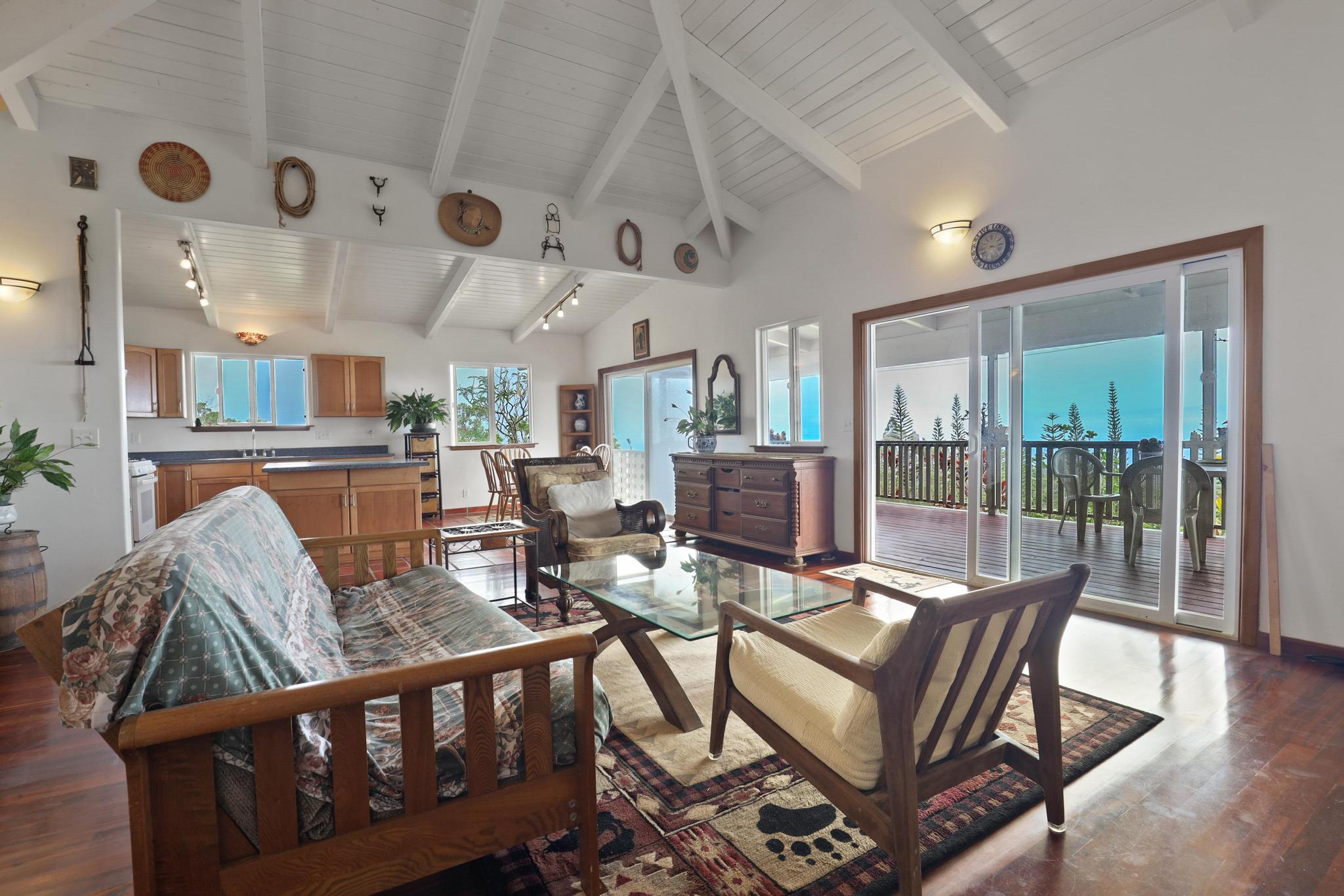 34-1480 Honomainoa Road Papaaloa, HI 96764 - Photo 26 of 30 a living room with furniture and wooden floor