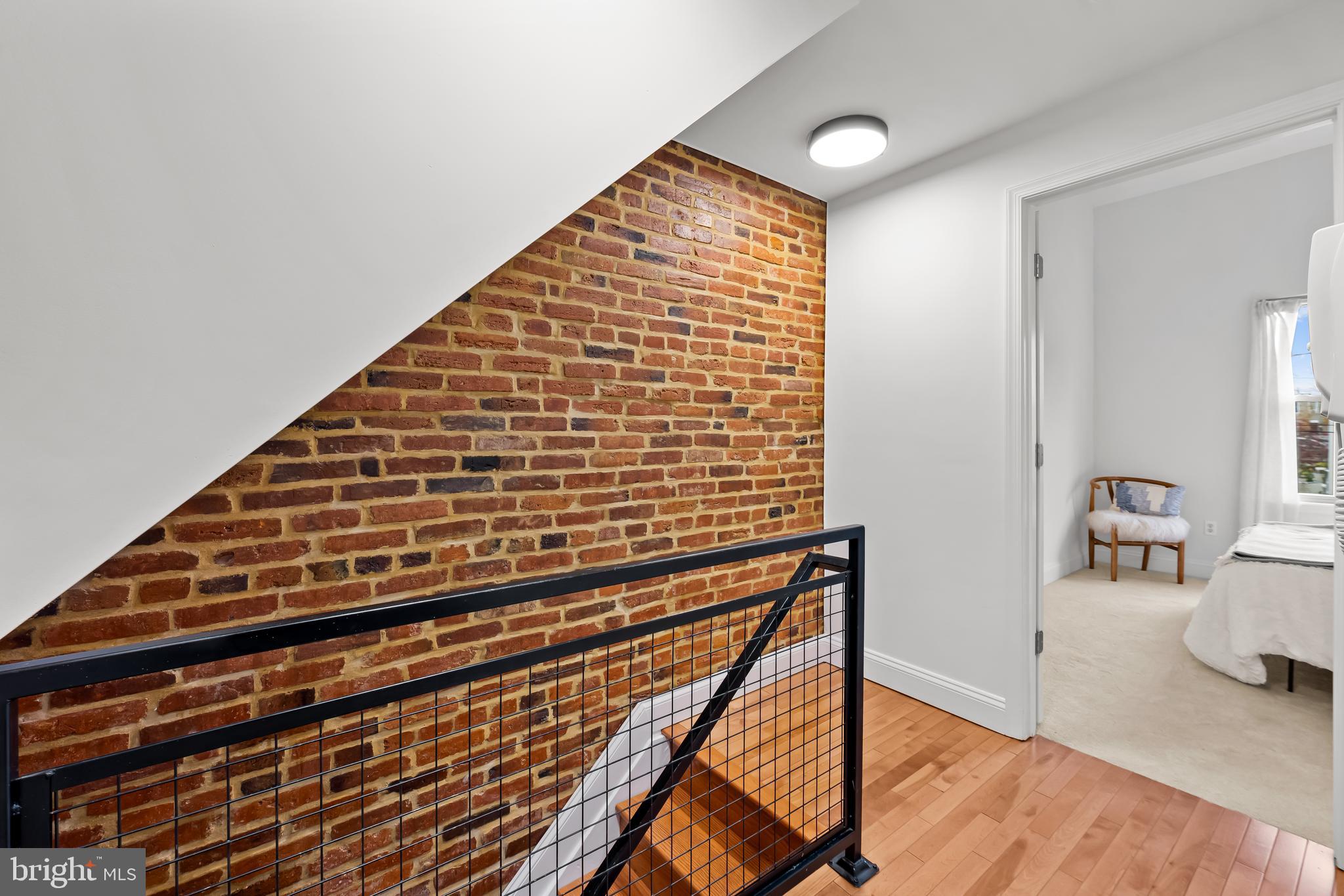 318 West 28th Street Baltimore, MD 21211 - Photo 14 of 34 Exposed brick and metal work detail