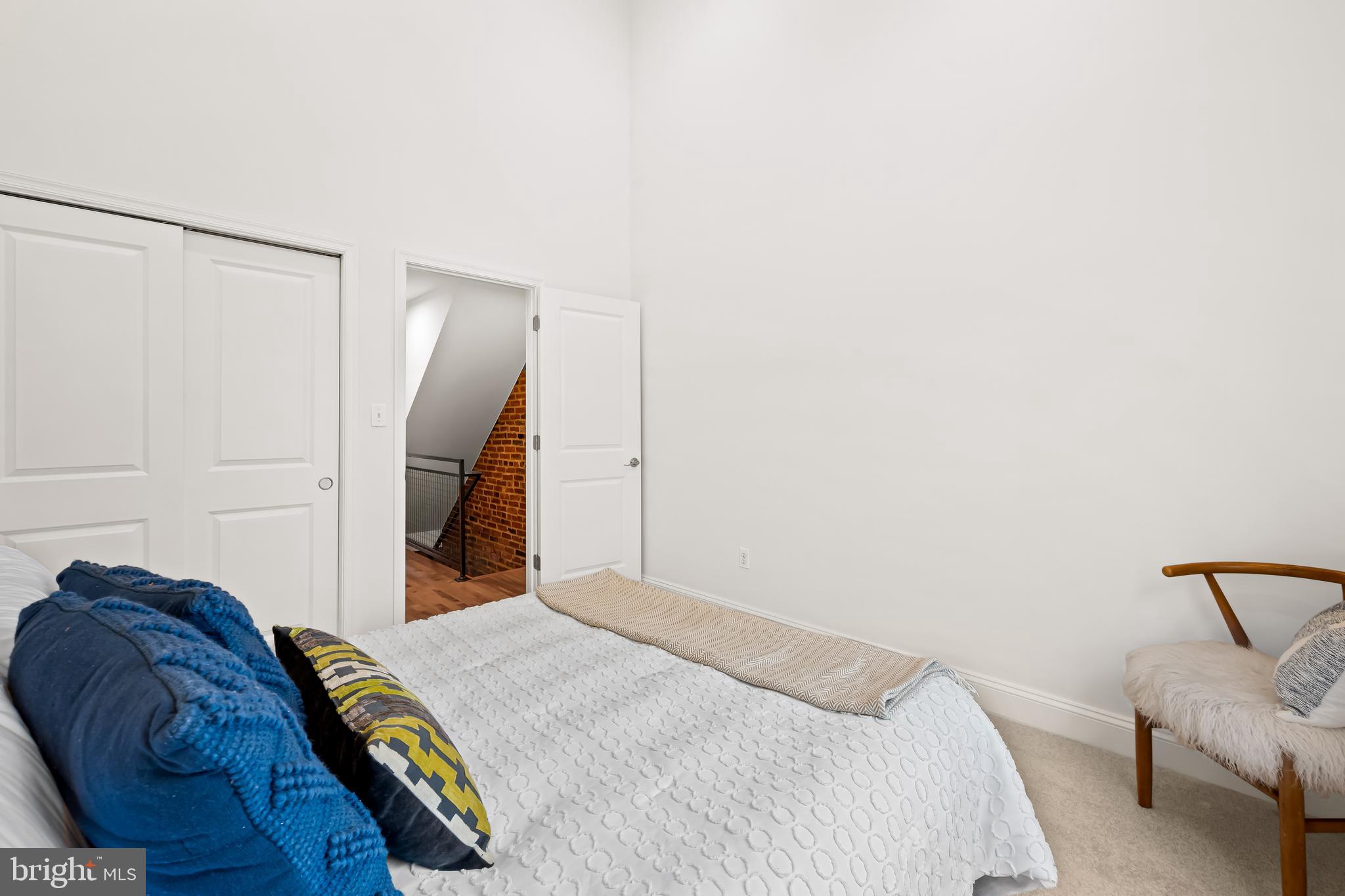 318 West 28th Street Baltimore, MD 21211 - Photo 17 of 34 Rear bedroom with vaulted ceilings