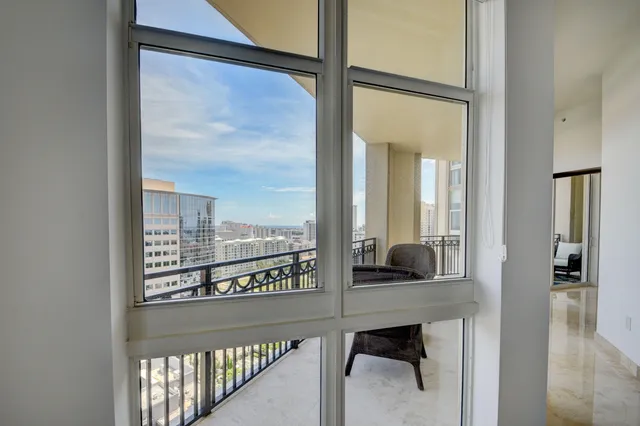 a view of a balcony with city view