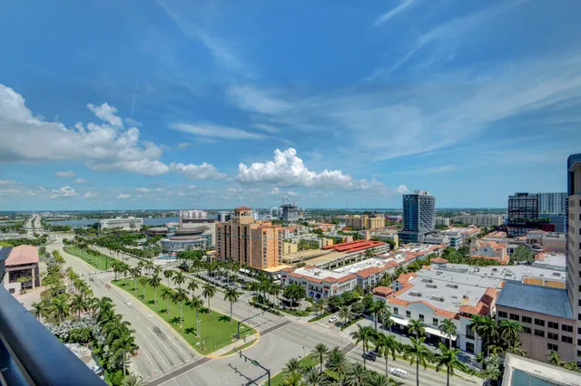 a bedroom with a bed and a night stand
