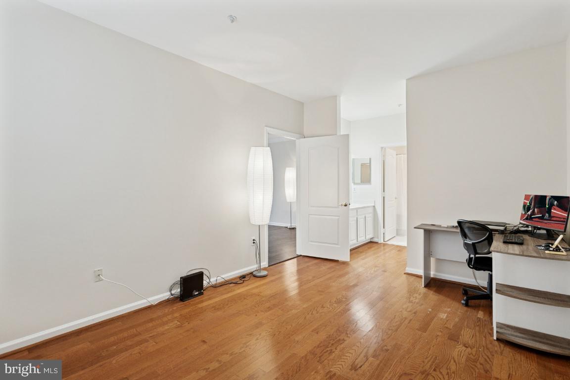 20903 Cedarpost Square, Unit 101 Ashburn, VA 20147 - Photo 18 of 26 a view of a workspace with furniture