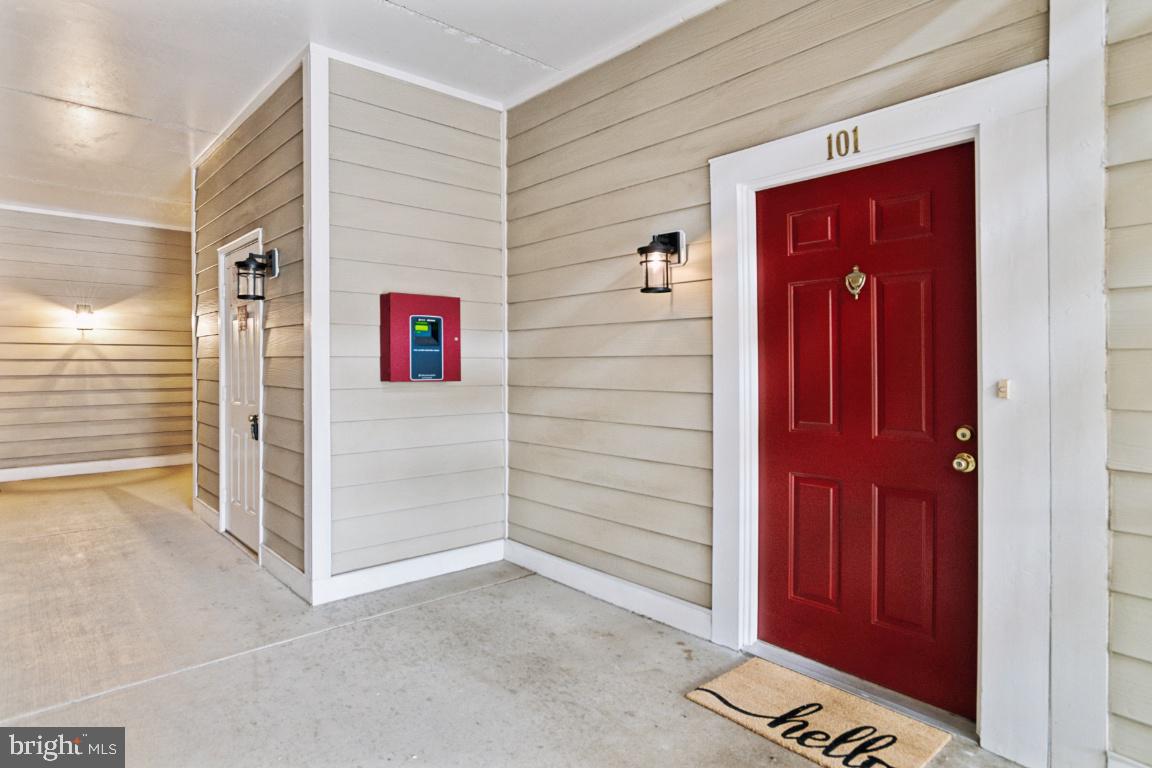 20903 Cedarpost Square, Unit 101 Ashburn, VA 20147 - Photo 25 of 26 a view of front door