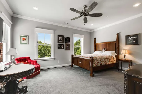 a bed room with a bed and a window