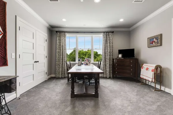 a view of a livingroom with furniture and window