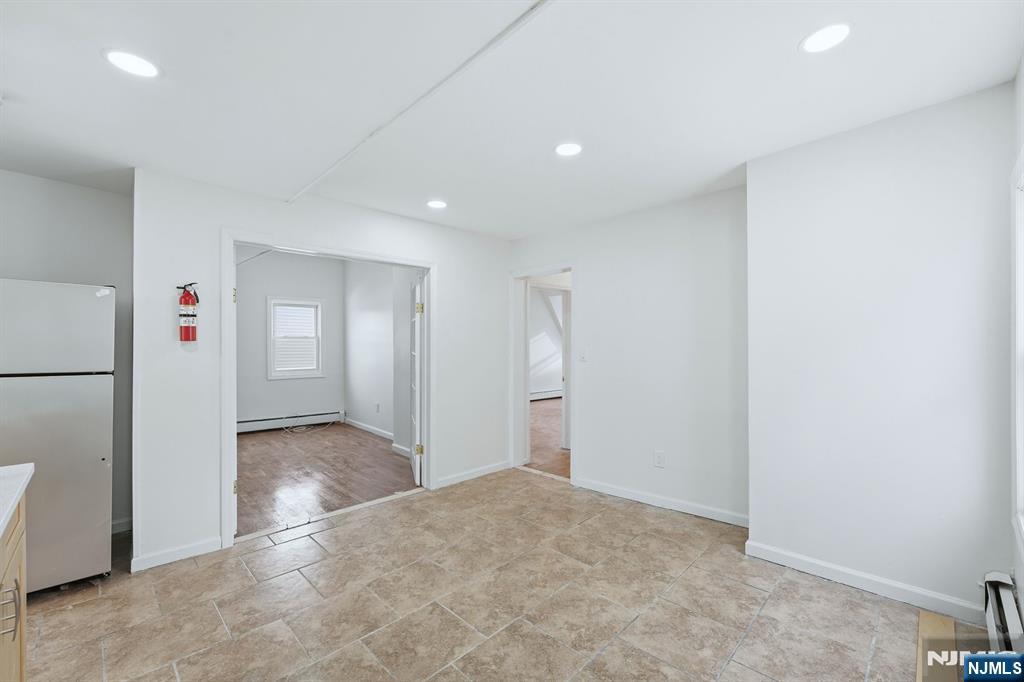 72 South 13th Street Newark, NJ 07107 - Photo 22 of 40 a view of a livingroom with a refrigerator