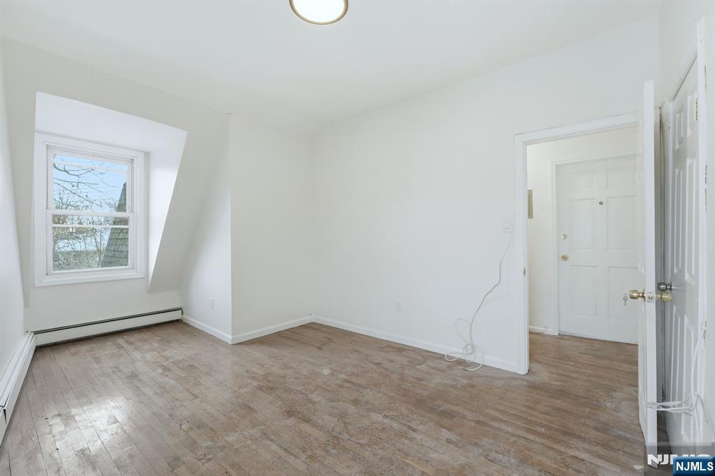 72 South 13th Street Newark, NJ 07107 - Photo 25 of 40 a view of an empty room and window