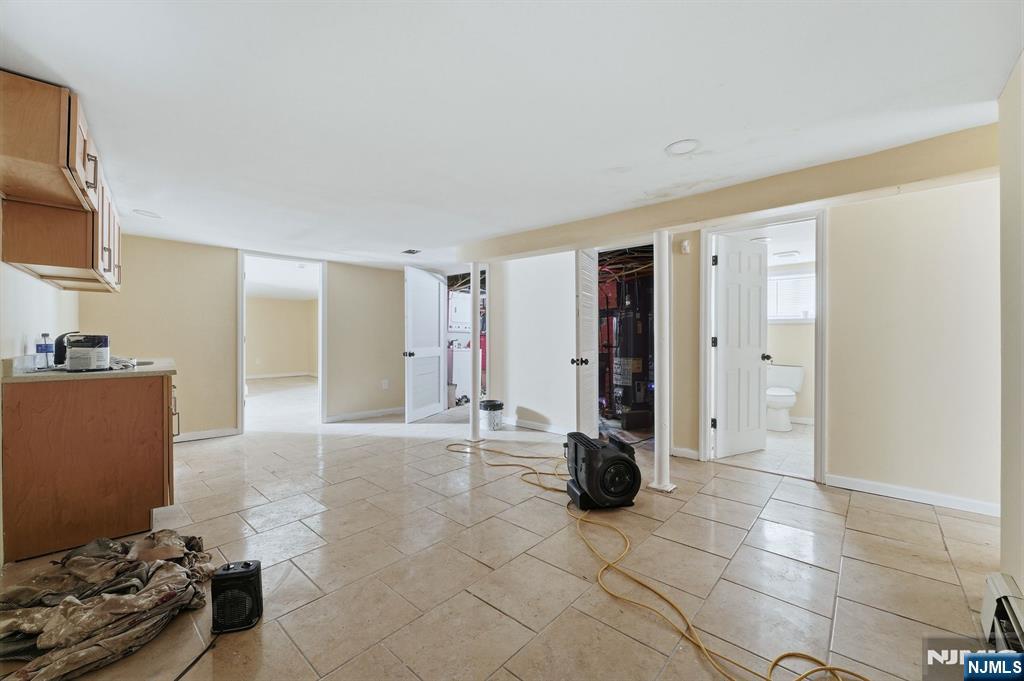 72 South 13th Street Newark, NJ 07107 - Photo 29 of 40 a view of a entryway and livingroom with furniture