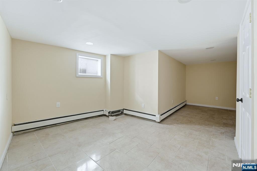 72 South 13th Street Newark, NJ 07107 - Photo 32 of 40 a view of a room with drop ceiling