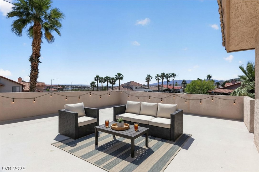 3698 Laughlin Boulevard Laughlin, NV 89029 - Photo 43 of 49 Enjoy the commanding views from this generously proportioned rooftop patio, ideal for outdoor gatherings.