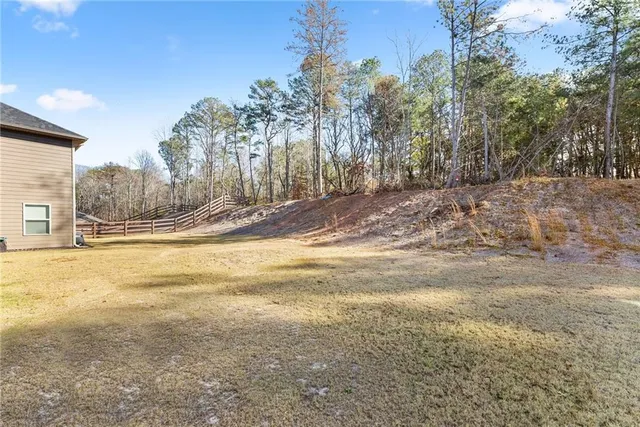 a view of a yard with an trees