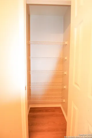 a view of a big room with wooden floor