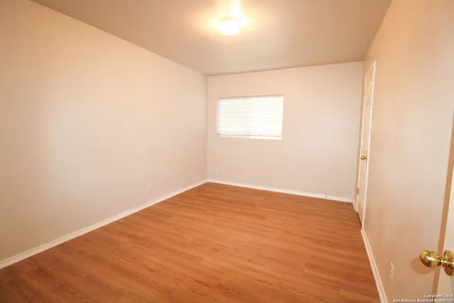 an empty room with a window