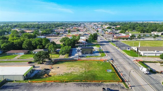 a view of a swimming pool and a chairs