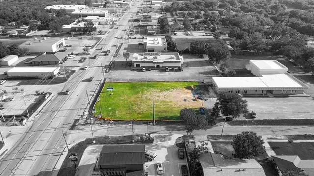 a view of swimming pool with outdoor seating and yard