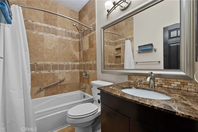 a view of parking garage with cars parked