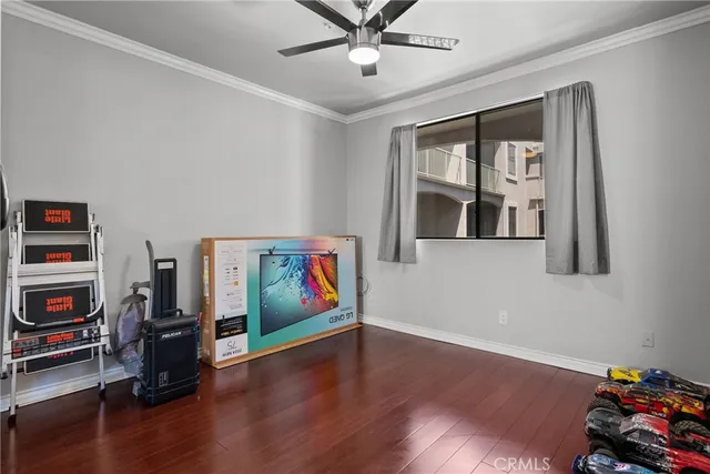 a view of parking garage with cars parked