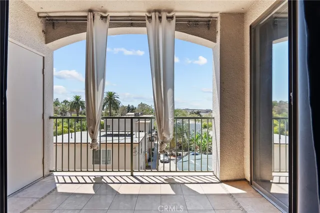a front view of a house with a yard and a garage