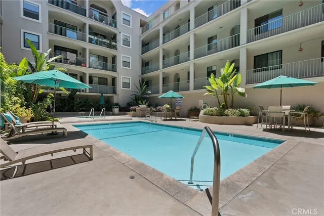 an aerial view of residential building and trees
