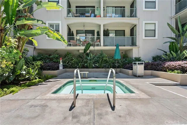 a view of kitchen with furniture and wooden floor