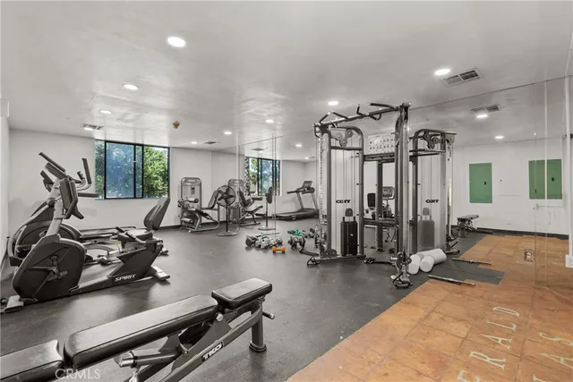 a view of a building with palm trees