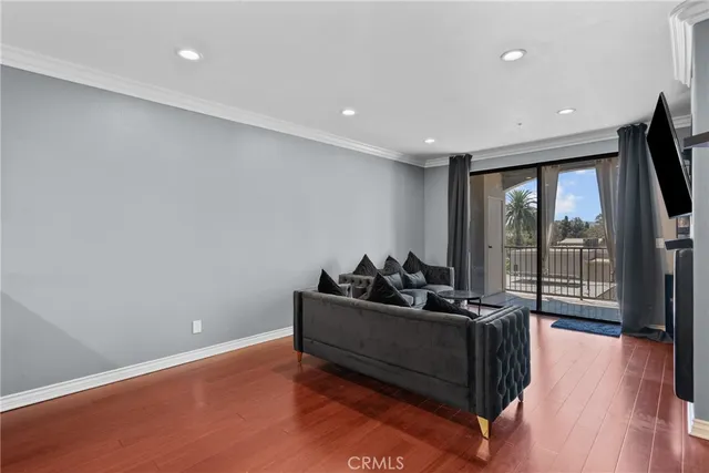 a kitchen with a refrigerator stove and cabinets