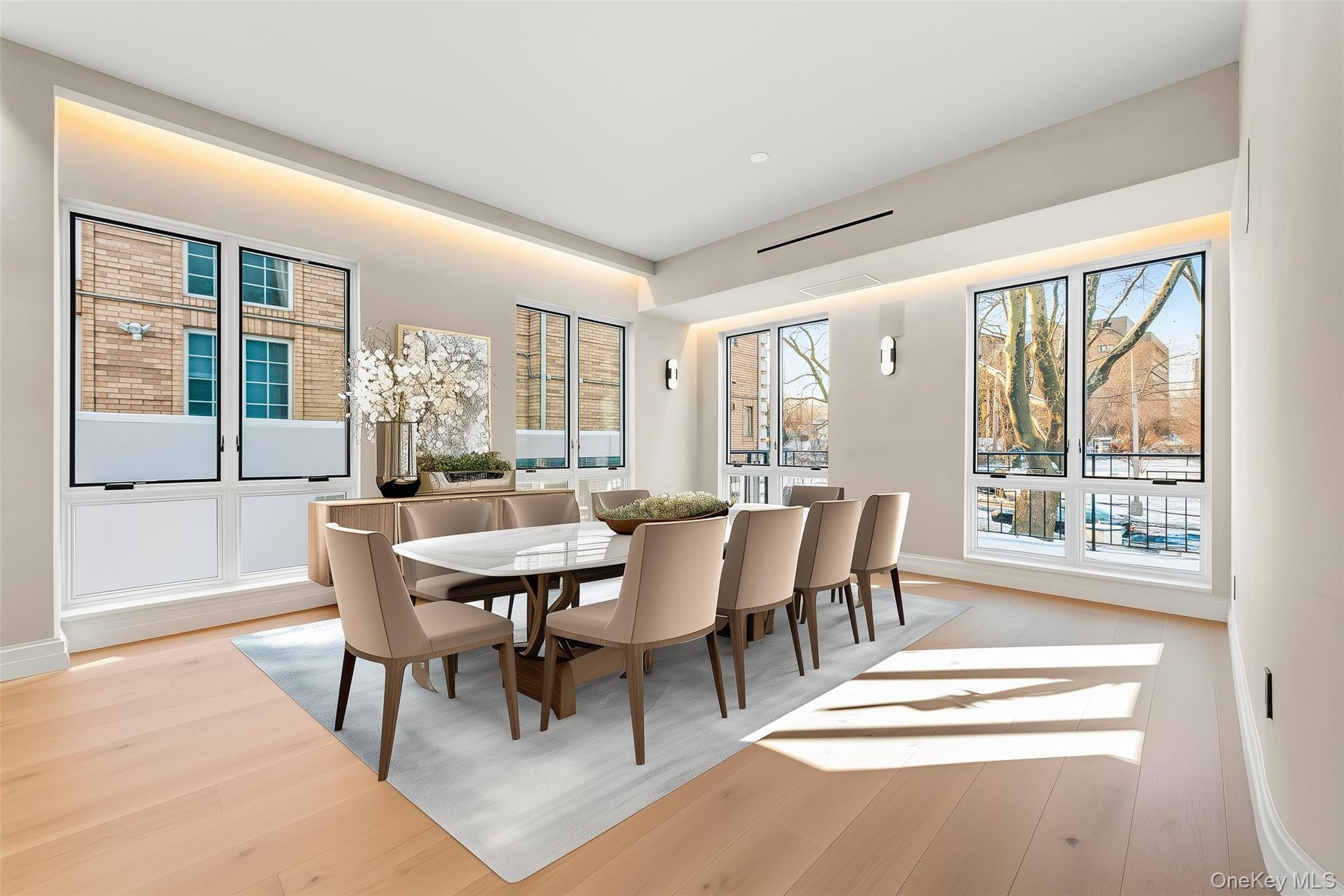 176-12 Kildare Road Queens, NY 11432 - Photo 3 of 34 a view of a dining room with furniture large windows and wooden floor