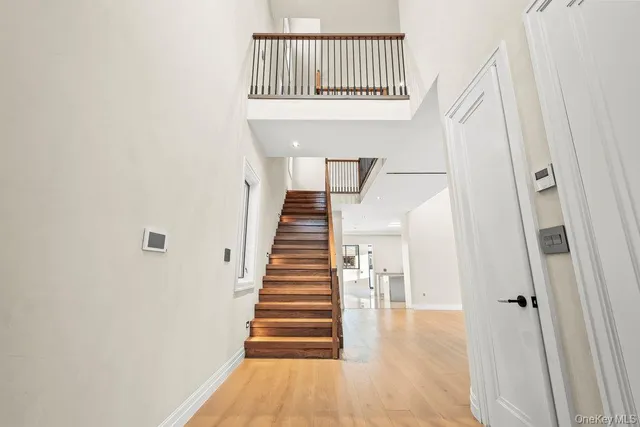 a view of entryway with wooden floor
