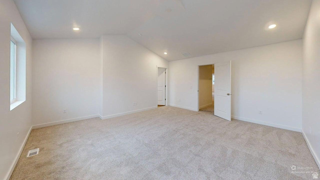 777 Pheasantbrook Drive, Unit 2B Centerville, UT 84014 - Photo 28 of 42 Spacious room featuring light-toned carpet flooring, recessed lighting, white walls, and white trim