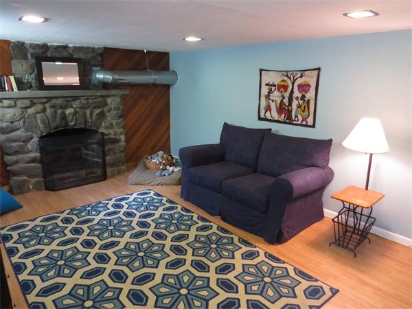 48 Prospect Road Andover, MA 01810 - Photo 14 of 23 a living room with furniture and a fireplace