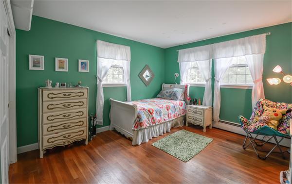 48 Prospect Road Andover, MA 01810 - Photo 15 of 23 a bedroom with a bed and a window
