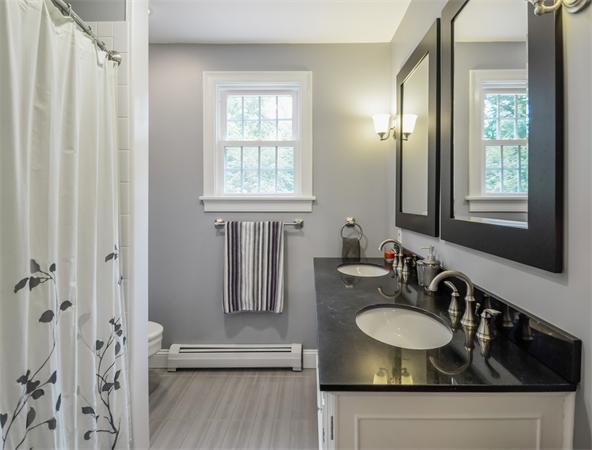 48 Prospect Road Andover, MA 01810 - Photo 8 of 23 a bathroom with a sink and a mirror