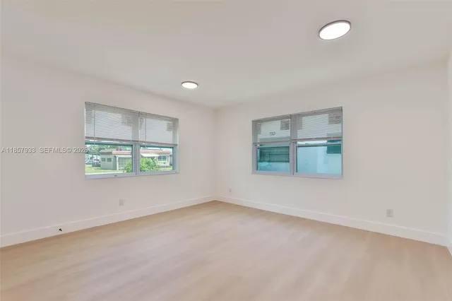 an empty room with windows