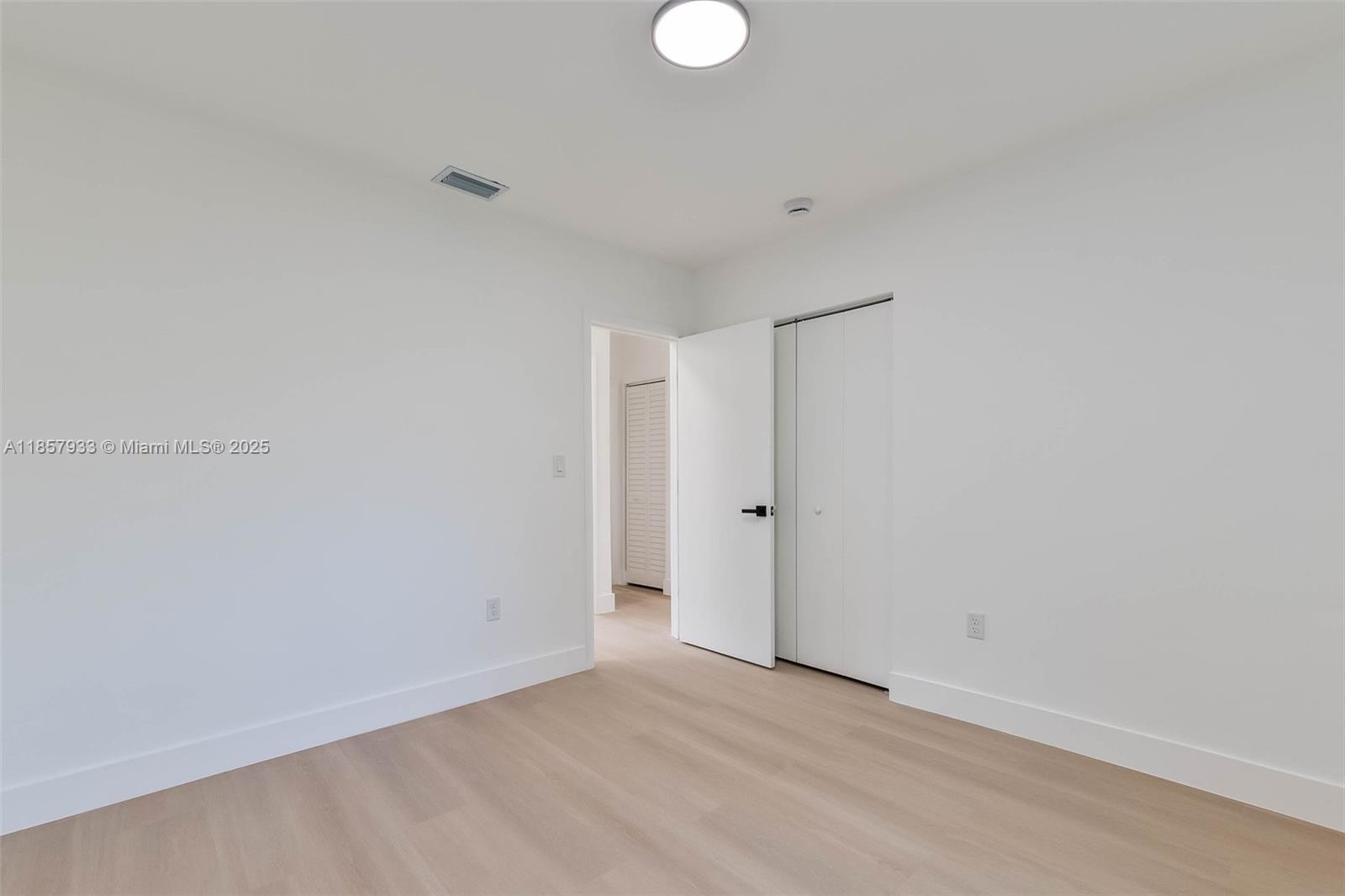 1366 Northwest 75th Street Miami, FL 33147 - Photo 19 of 26 a view of an empty room