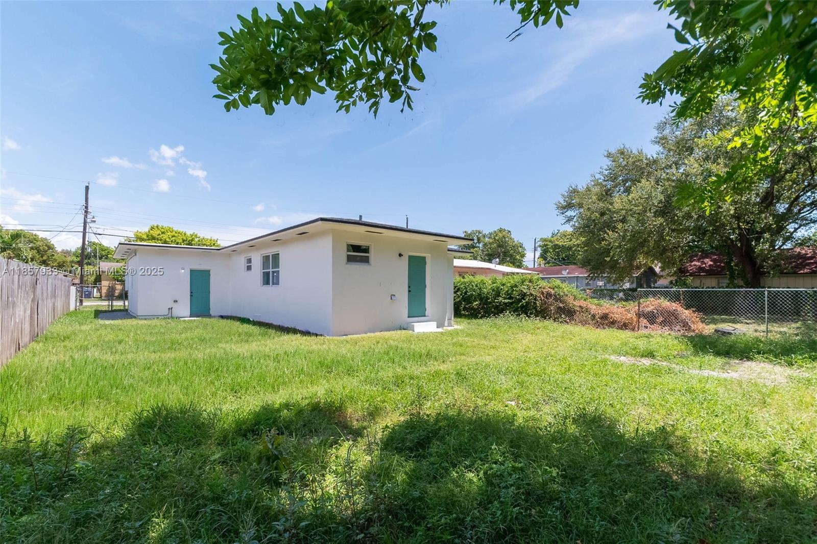 1366 Northwest 75th Street Miami, FL 33147 - Photo 26 of 26 a house view with a garden space