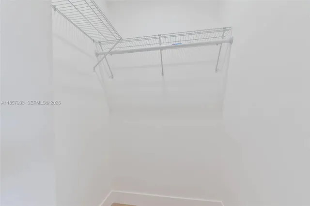 a view of a room with racks on the wall