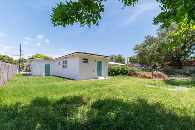 a house view with a garden space
