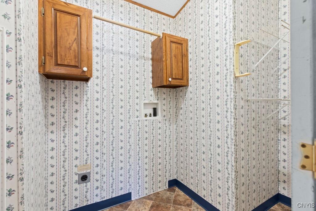 94 Avery Road Constantia, NY 13044 - Photo 16 of 35 Laundry is off of kitchen and leads to attached ga