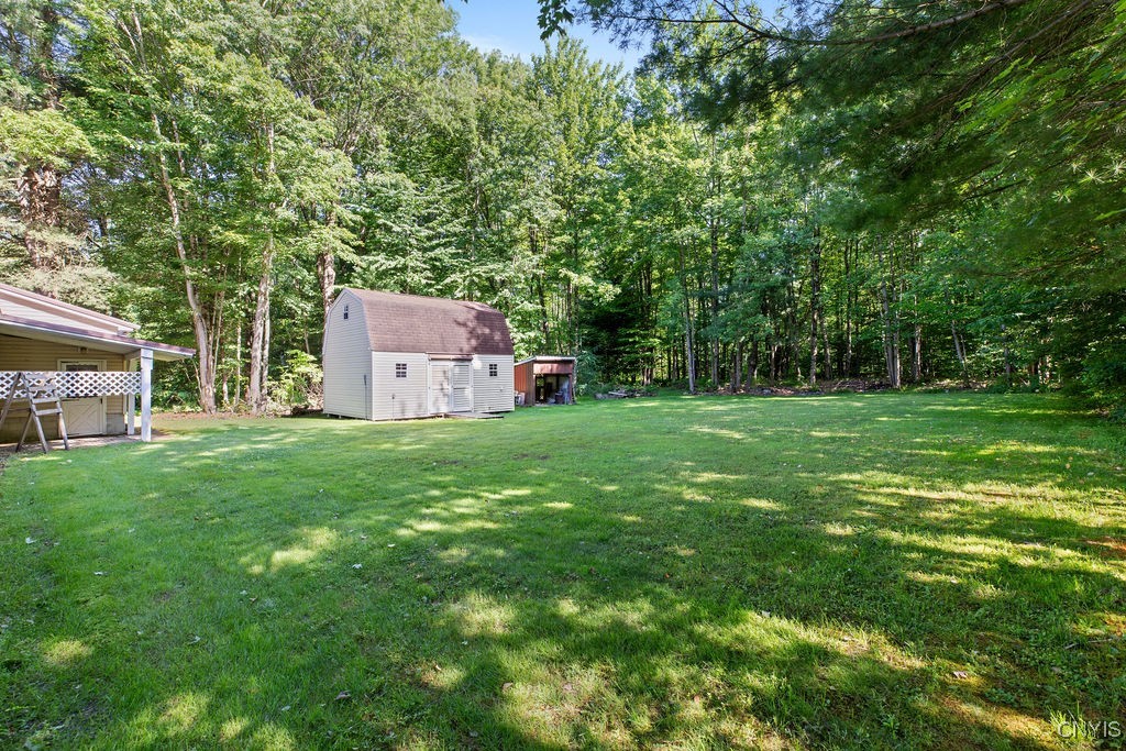 94 Avery Road Constantia, NY 13044 - Photo 33 of 35 20' x 16' x 15' shed with upstairs & electric